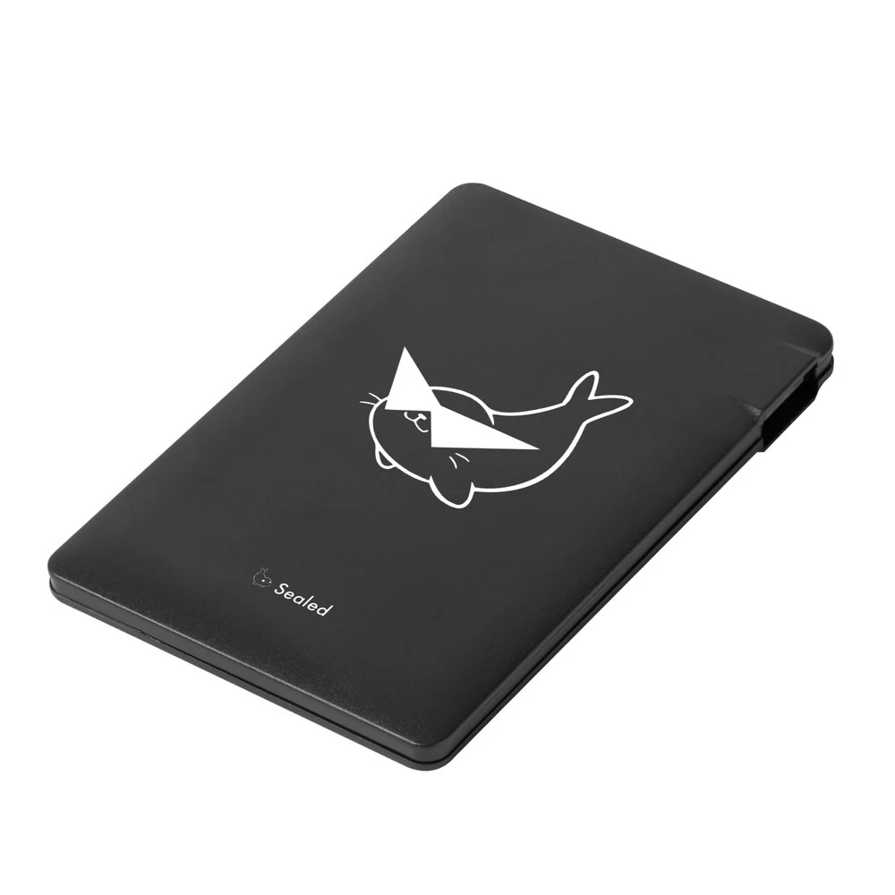 Black Sealed portable battery with the white glasses mascot and Sealed wordmark.